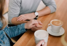 man and woman holding hands