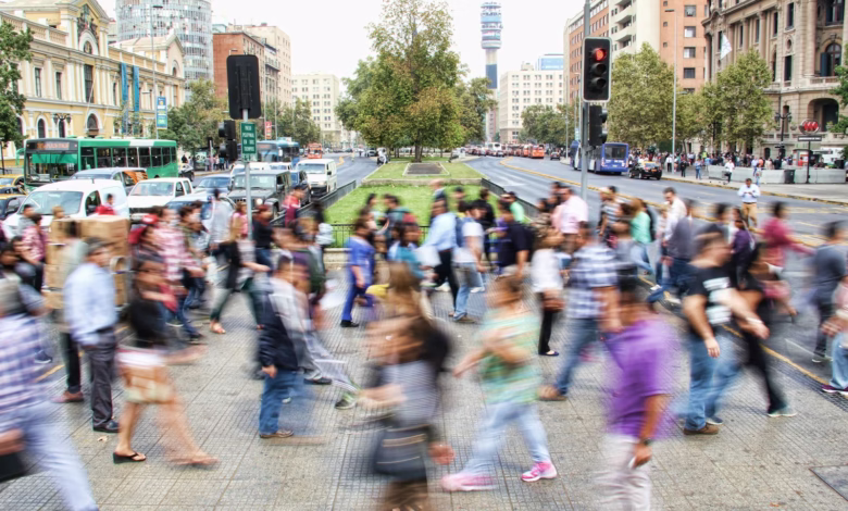 timelapse photo of people passing the street