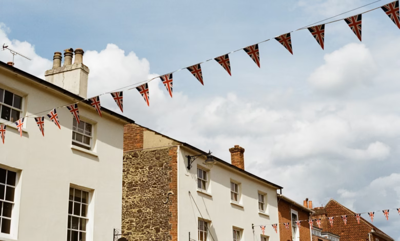 Buildings decorated with uk flag bunting.