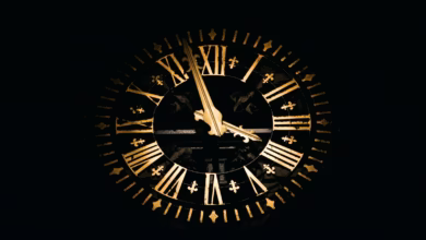 round black and brown analog clock