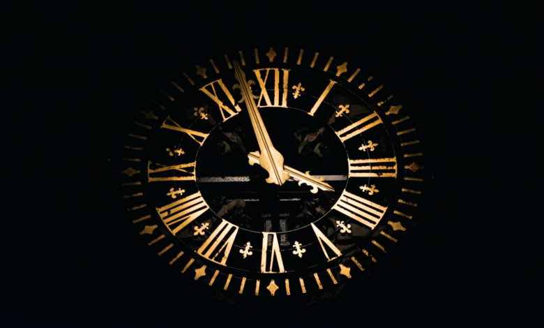 round black and brown analog clock