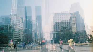 Cityscape of buildings and people, a double exposure.