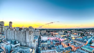 aerial photography of city buildings during yellow sunset