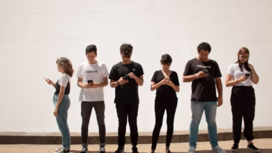group of people standing on brown floor