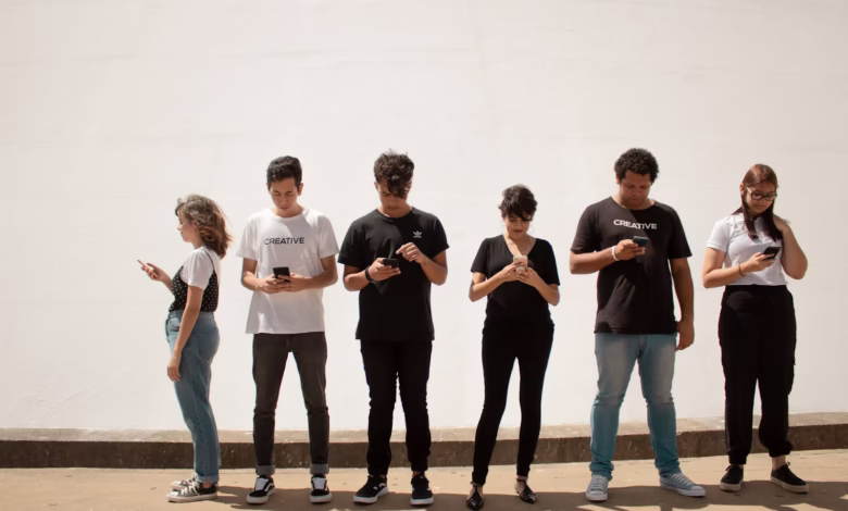 group of people standing on brown floor