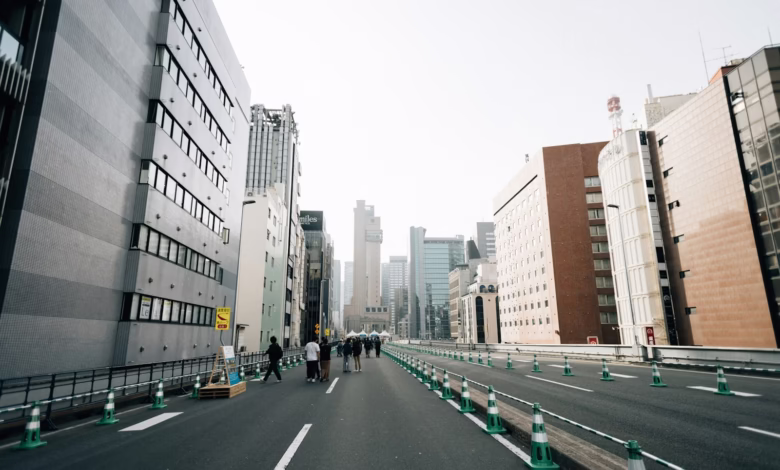 City street with modern buildings and people walking