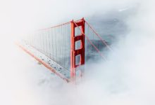 Golden gate bridge tower emerging from fog