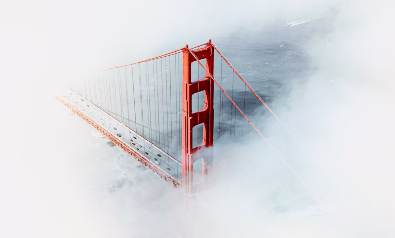 Golden gate bridge tower emerging from fog
