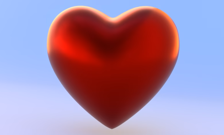A red heart shaped object on a blue background