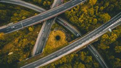 aerial photography of interlocking freeways with travelling cars