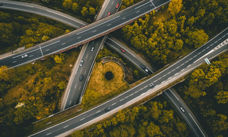 aerial photography of interlocking freeways with travelling cars