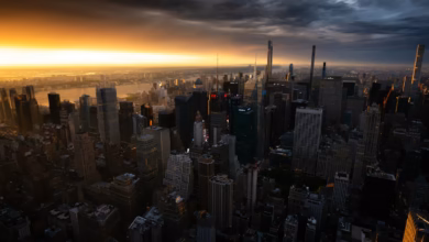 Dramatic sunset over a dense cityscape with tall buildings