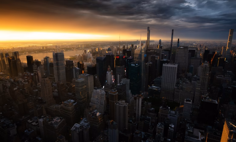 Dramatic sunset over a dense cityscape with tall buildings