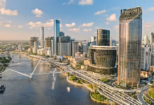Aerial view of the Brisbane skyline and the Brisbane River at golden hour