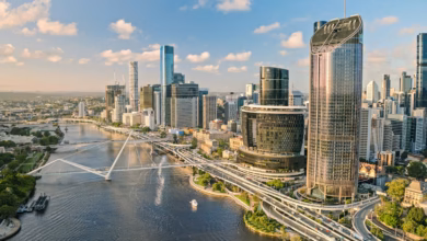 Aerial view of the Brisbane skyline and the Brisbane River at golden hour