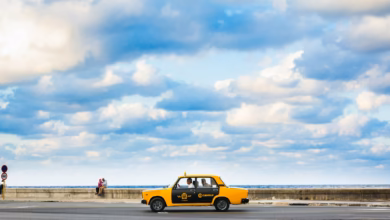 yellow and black car on beach during daytime