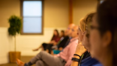 a group of people sitting in a room